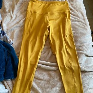 Women’s yellow leggings size M